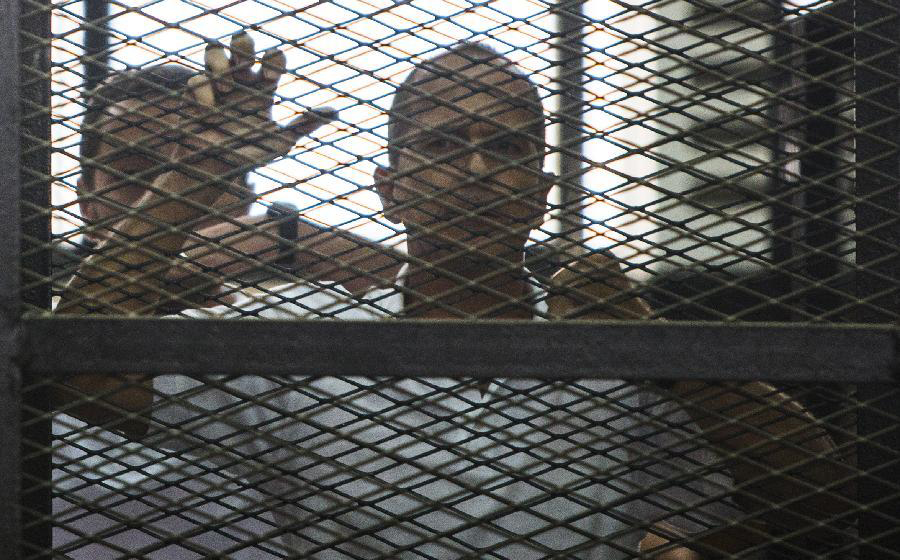 Egypt sentences three Jazeera journalists to 7 yrs