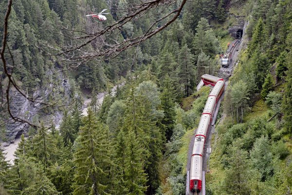Swiss passenger train derails into ravine, 11 injured