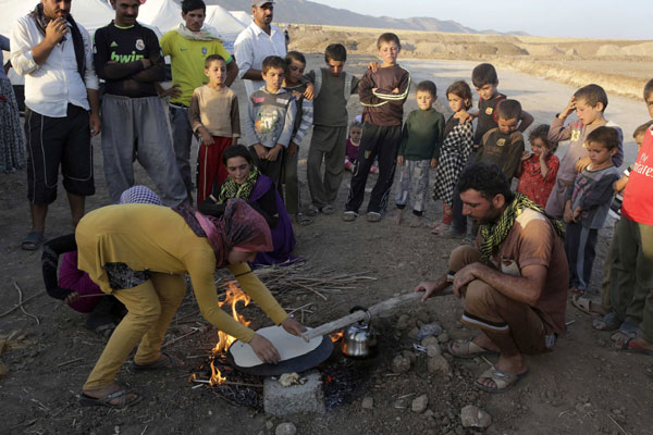 Militants kill 80 Yazidis, kidnap women in north Iraq