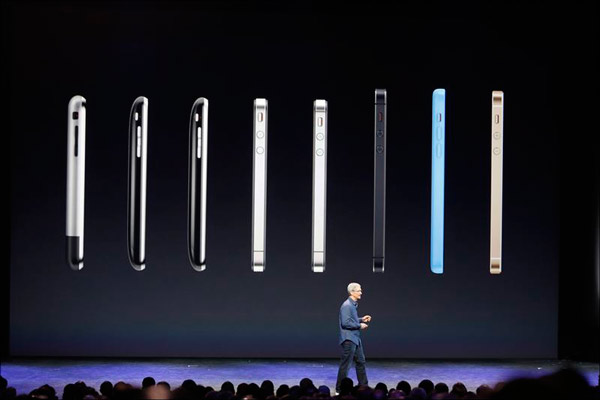 Apple unveils the Watch, larger iPhones at star-studded event