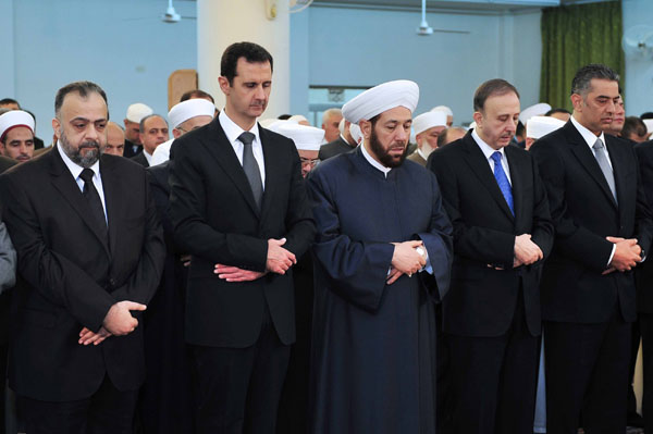 Syria's Assad pictured at Eid prayers in Damascus