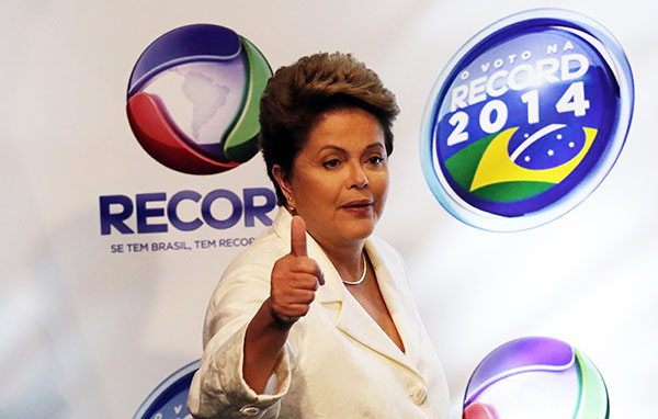 Brazil election poll shows Rousseff gaining momentum over Neves