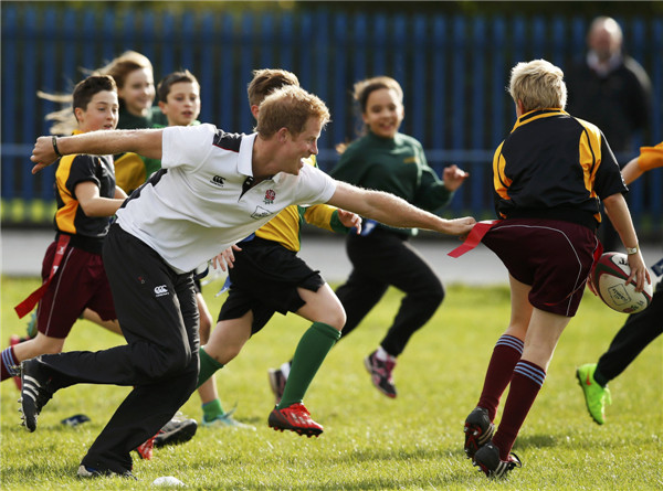 Prince Harry gets in game on the rugby pitch