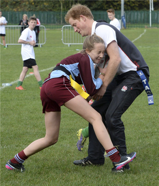 Prince Harry gets in game on the rugby pitch
