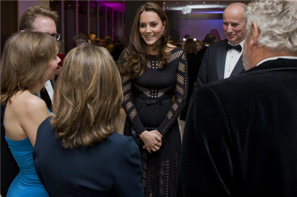 Pregnant Kate stuns in knit dress at charity gala