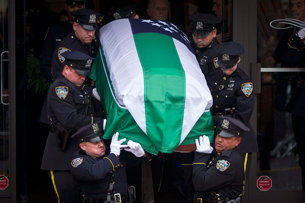 Thousands gather in NYC for funeral for slain police officer