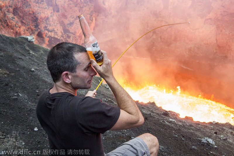 Daredevil roasts marshmallows over volcano