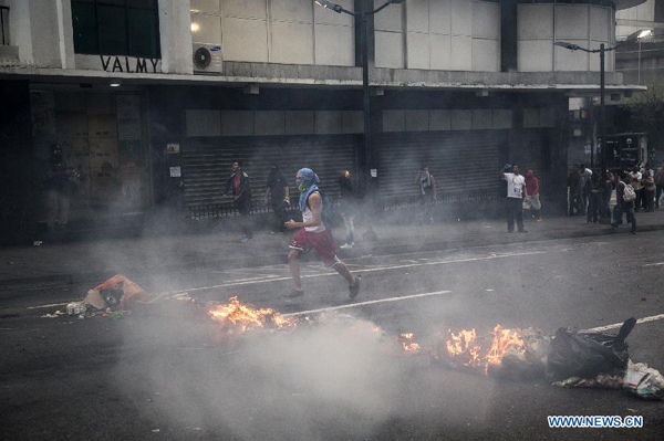 Venezuela marks anniversary of protests amid clashes