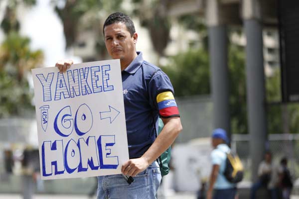 Venezuelans march in solidarity with govt