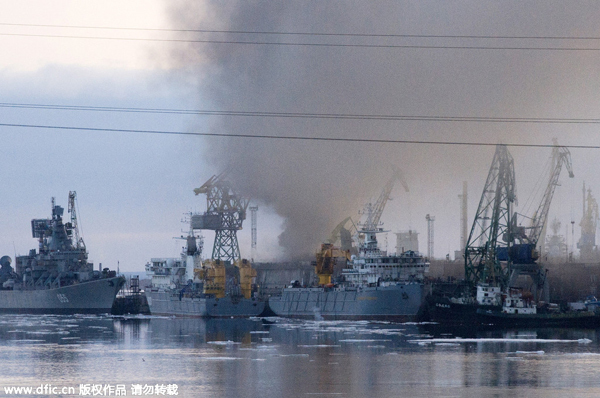 Russian nuclear sub on fire in dock, no casualties reported