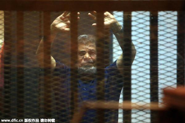 Gunmen kill 3 judges hours after Morsi's death sentence