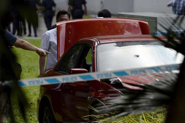 Suspects charged with heroin trafficking in Shangri-La shooting in Singapore
