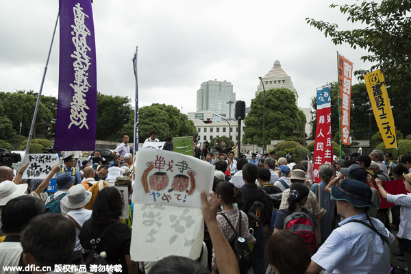 Demonstrators protest against Abe's security bills