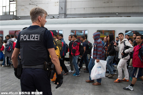 Germany re-imposes border controls to slow migrant arrivals