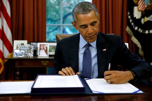Obama signs two-year budget bill