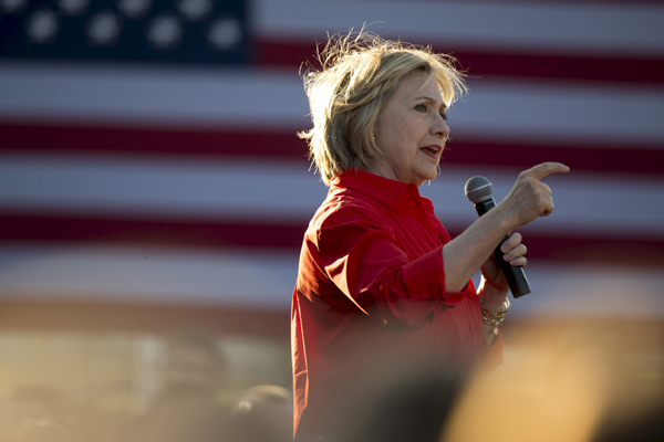 Clinton calls for US minimum wage increase to $12 an hour