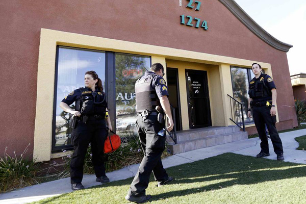 Shooting rampage at California social services agency leaves 14 dead, 14 wounded
