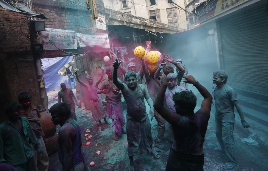 Dancing in bright colors of Holi