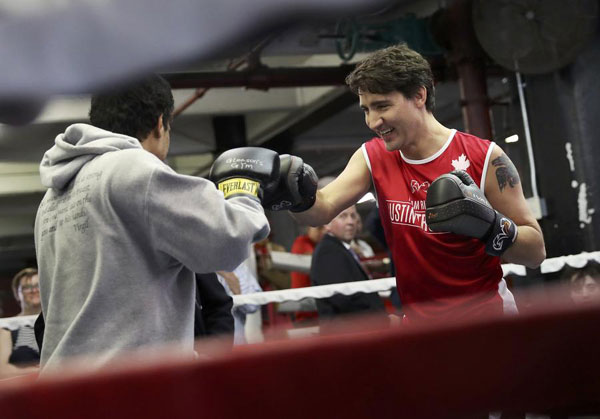 Canadian PM Trudeau slips from political ring to boxing ring