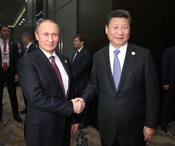 China stresses Putin's expected visit