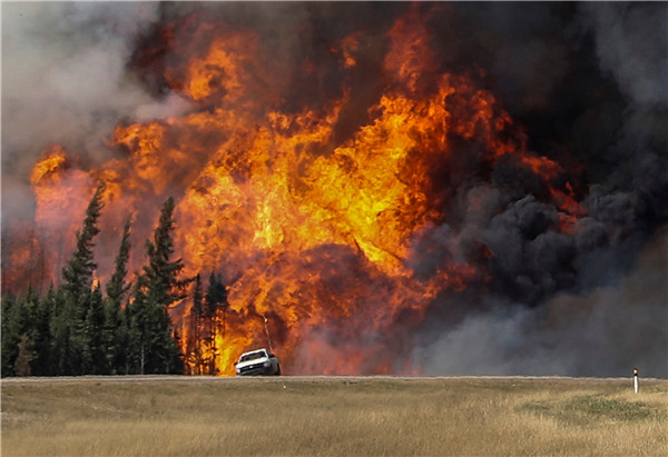 Canada getting on top of Alberta wildfire, Fort McMurray off limits