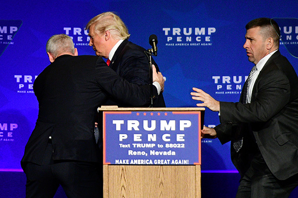Donald Trump rushed off stage in Nevada amid disturbance