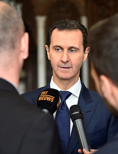 Syria's Assad receives freed women, children abducted by rebels