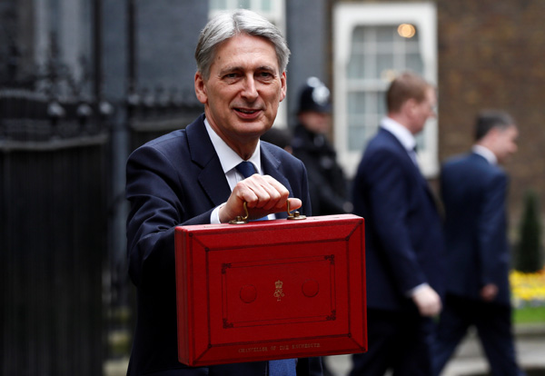 British gov't reveals tax rises for strong economy