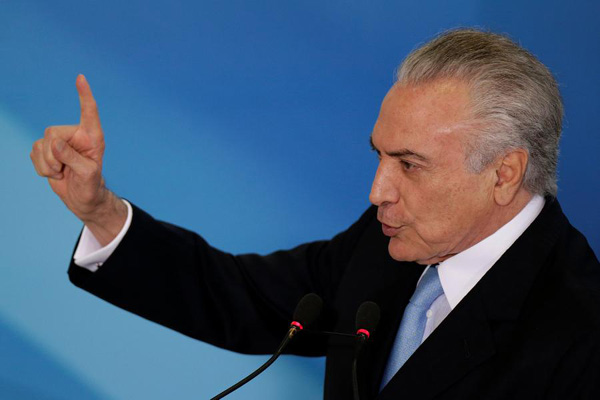 Brazil's president seeks to postpone interrogation by police