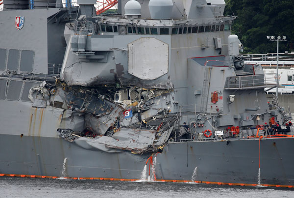 Seven missing sailors found dead aboard stricken US destroyer