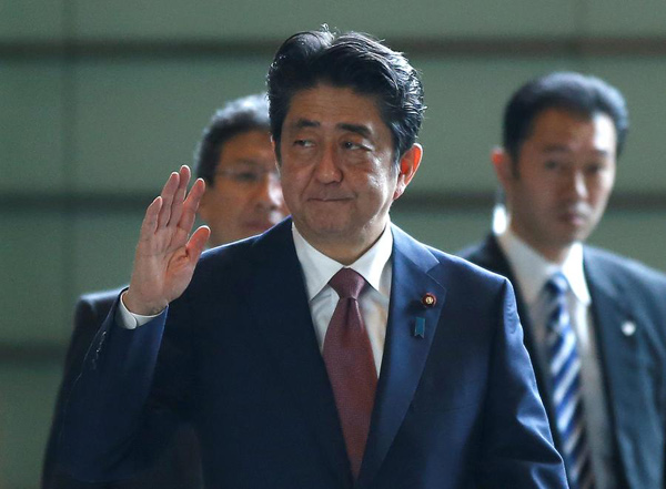 Japan Prime Minister Abe reshuffles Cabinet as support dips