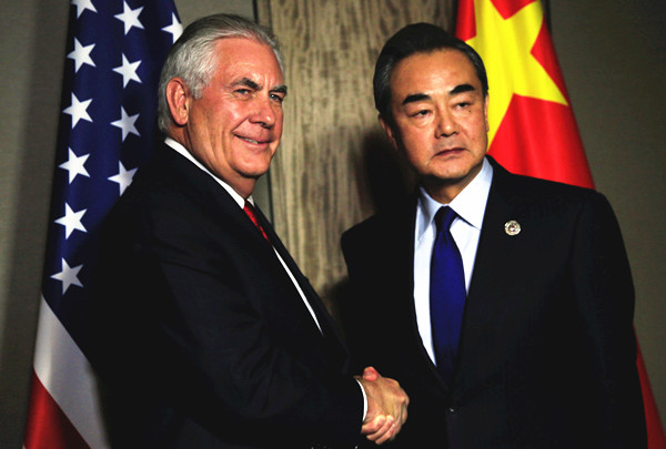 Wang, US counterpart hail interaction of two countries