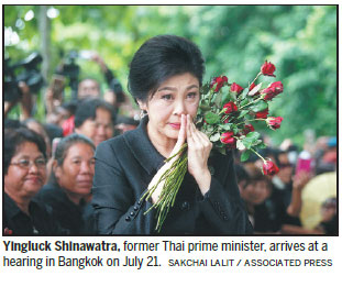 Thai court issues arrest warrant against Yingluck