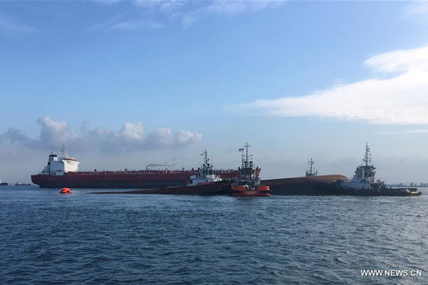 Ship carrying 11 Chinese crew members capsizes in Singaporean waters, 5 still missing