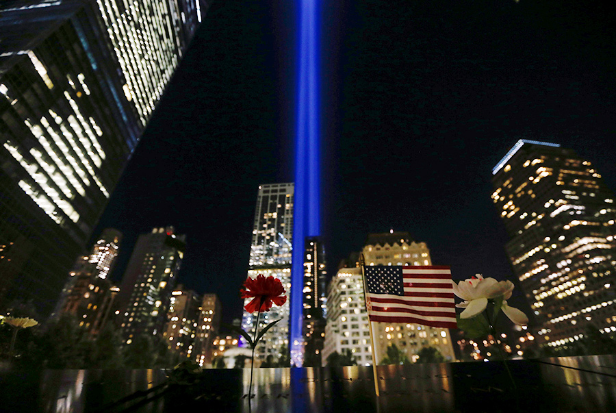 US marks 9/11 anniversary with resolve, tears and hope