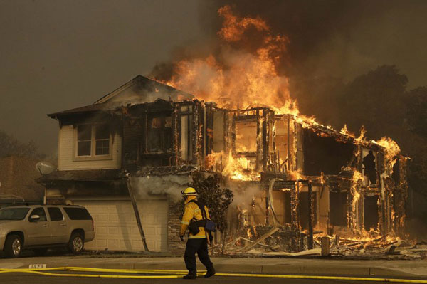 Windy wildfires sweep through California wine country
