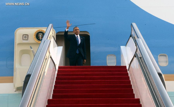 Obama arrives in Beijing for APEC meeting, state visit