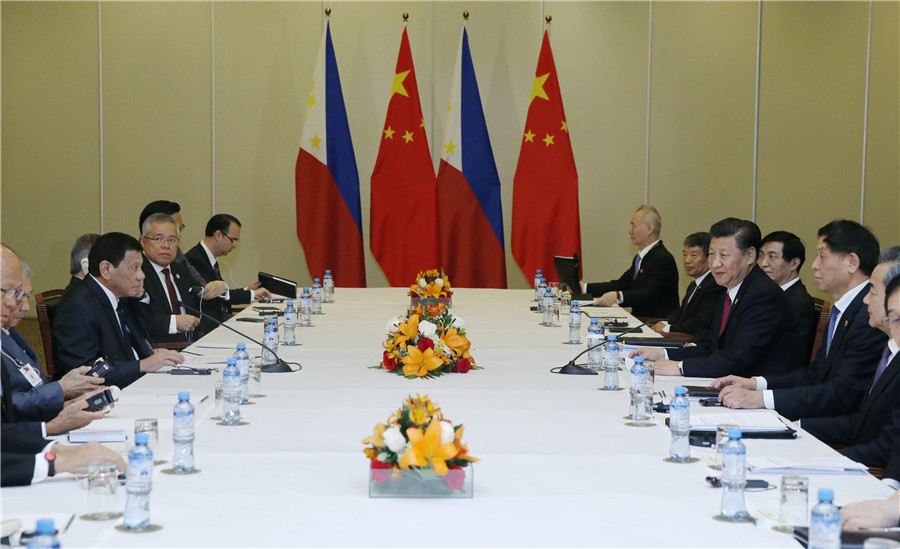 Xi talks global issues at APEC in Peru