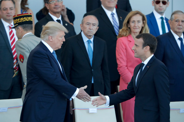 Trump touts ties amid Paris pomp