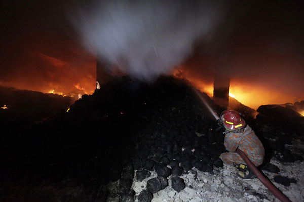 Bangladesh garment factory fire kills more than 100